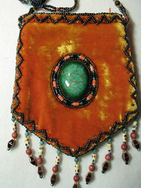 Orange amulet bag